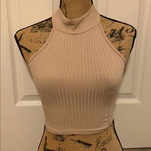 Tan cropped halter top.